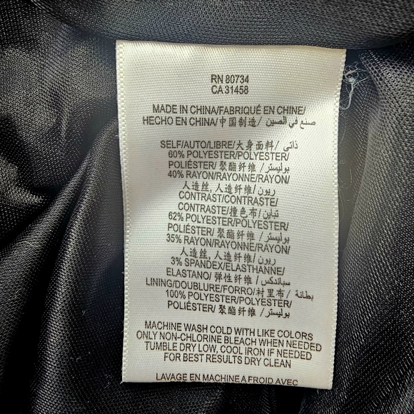 Classy Black Peplum Dress - Picture 6 of 8